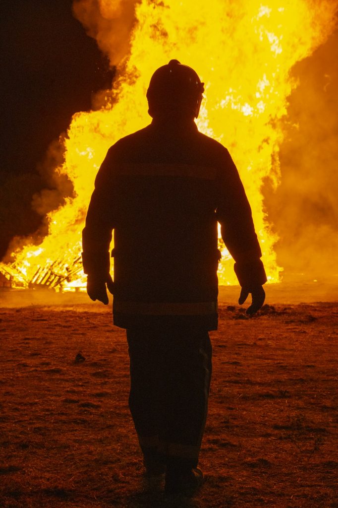 Firefighters putting out a fire. Destruction and disaster